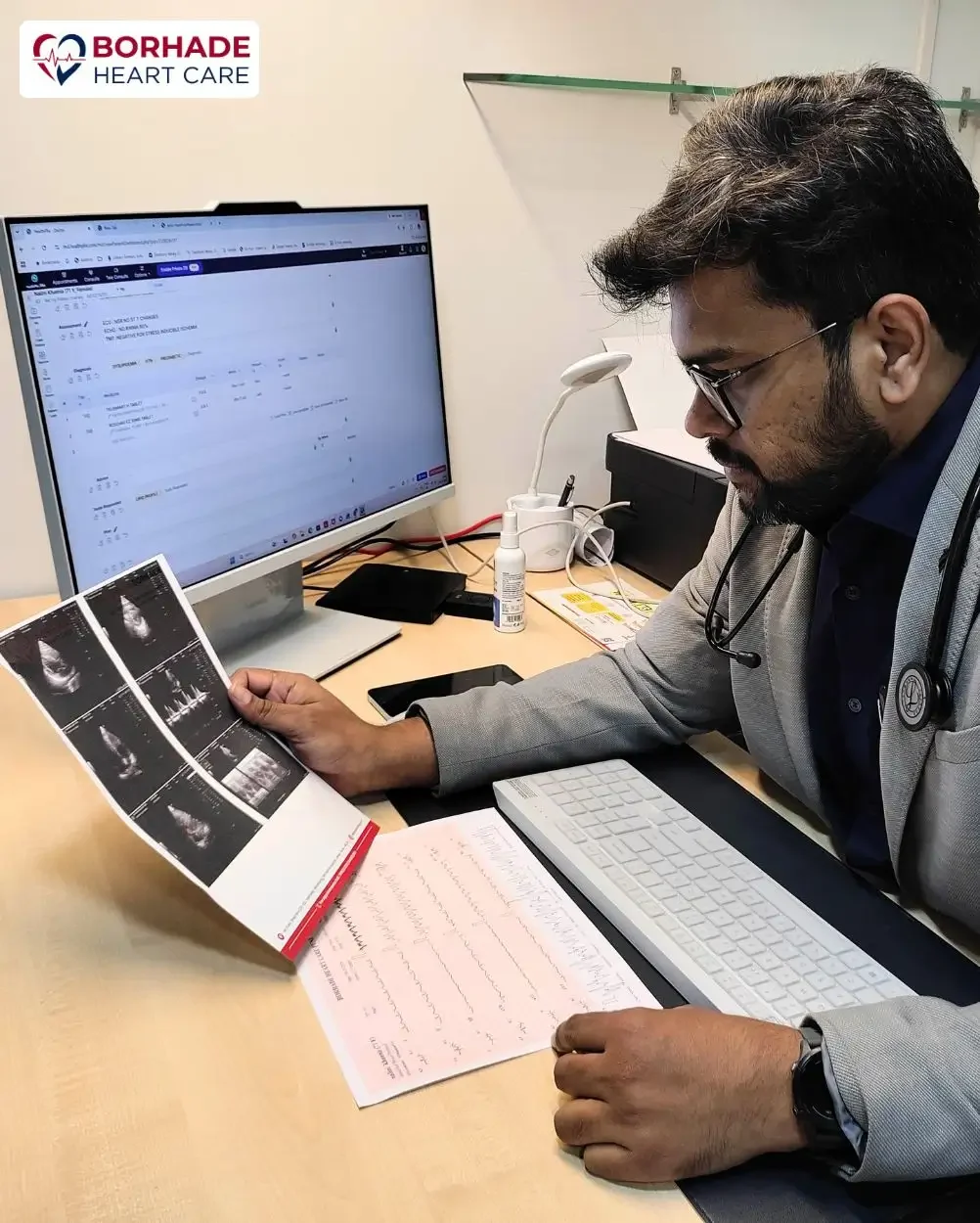 Dr. Ajinkya Borhade analysing results of 2D Echo Test in Pune.