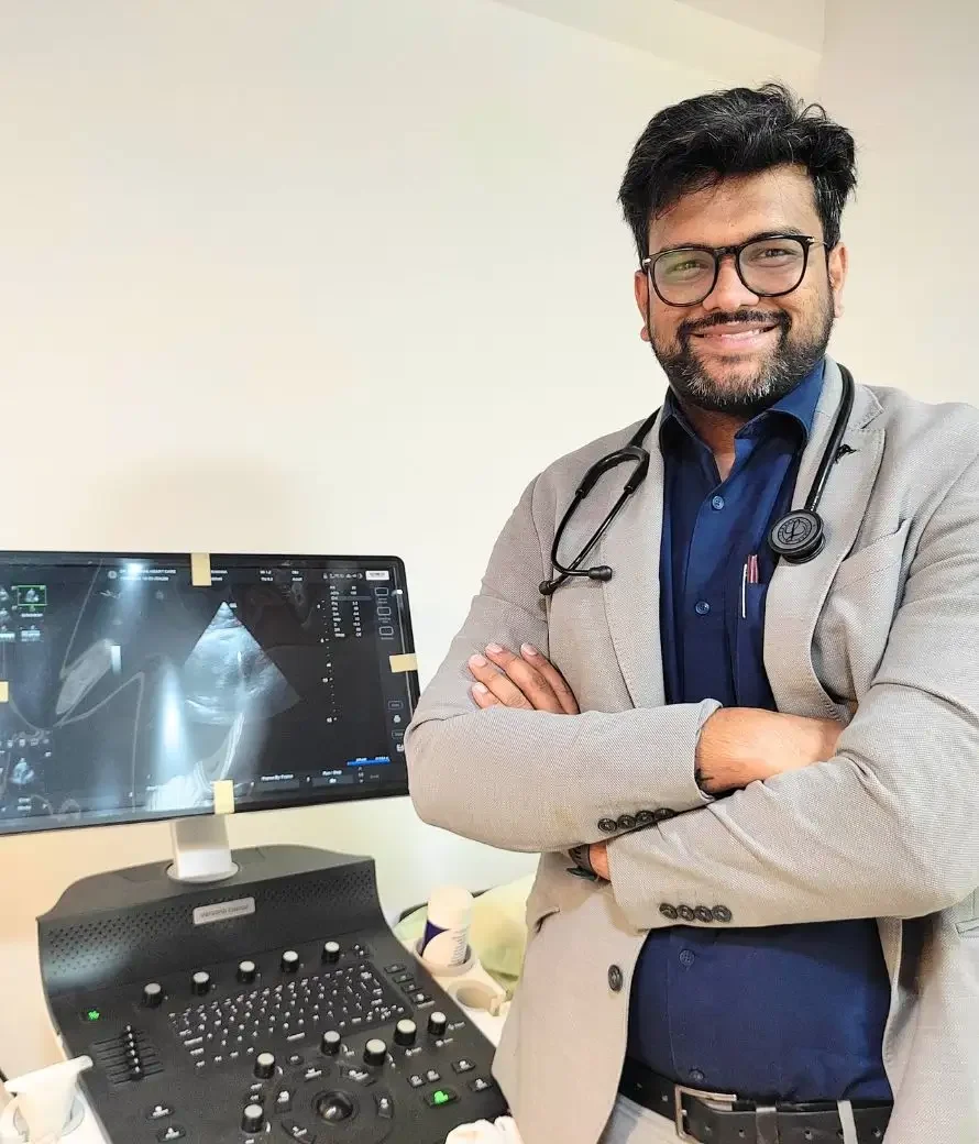 Dr. Ajinkya Borhade with his 2D Echo Machine at Borhade Heart Care, Ravet.