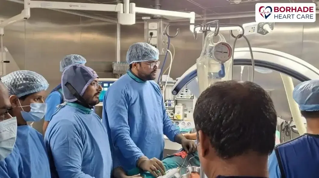 Dr. Ajinkya Borhade performing heart surgery in Pune.